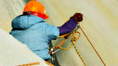 Ice climber on the ice wall Видео 36581295