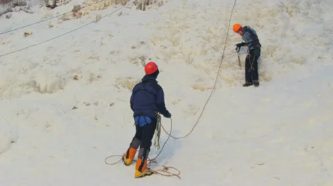 Ice climber trainiong with rope  Видео 36785514