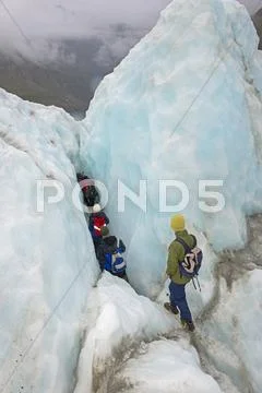 Ice Climbers On Fox Glacier, South Island, New Zealand
