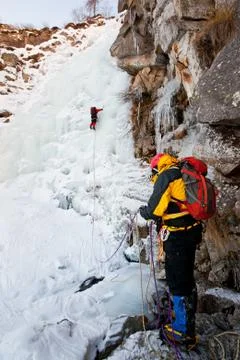 Ice climbing Stock Photos