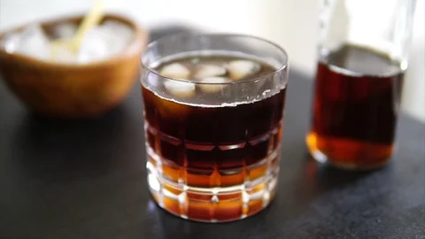 İce coffee on the black table Stock Footage 91877241