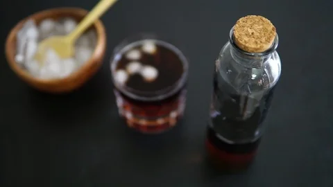 İce coffee on the black table Stock Footage 92347271