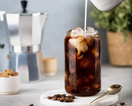 Ice coffee with ice cubes Stock Photos