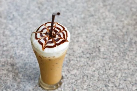 Ice coffee on table in cafe Stock Photos