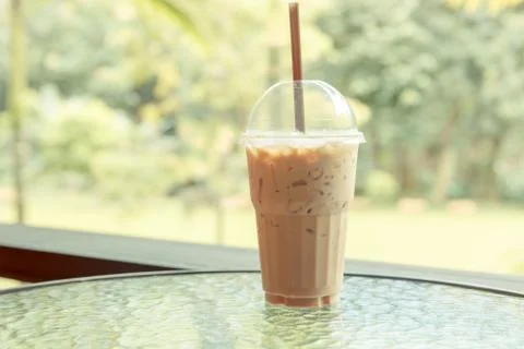 Ice coffee on table in cafe Stock Photos