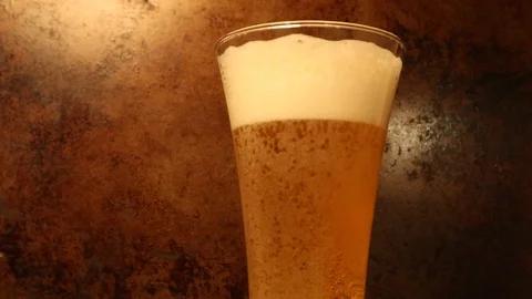 Ice Cold Draft Beer in Tall Beer Mug Stock-Footage 125194648