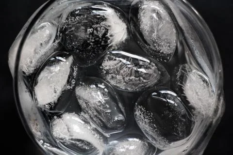 Ice in cold water. Stock Photos