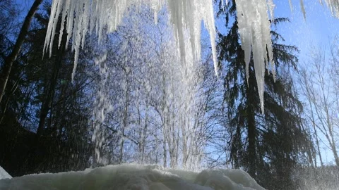 Ice cones on a frozen waterfall in the austrian alps Stock Footage 148498307