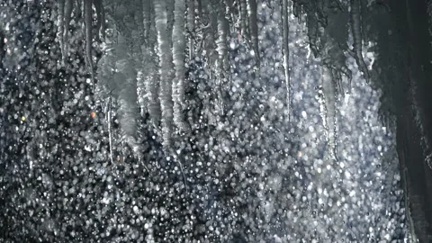 Ice cones on a frozen waterfall in the austrian alps Stock Footage 148498734