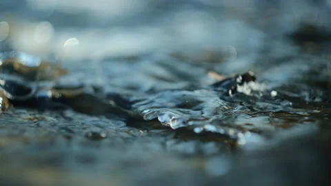 Ice covered rocks are in water. Snowy river Stock Footage 323770478
