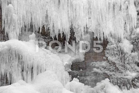 Ice covered waterfall Stock Photos