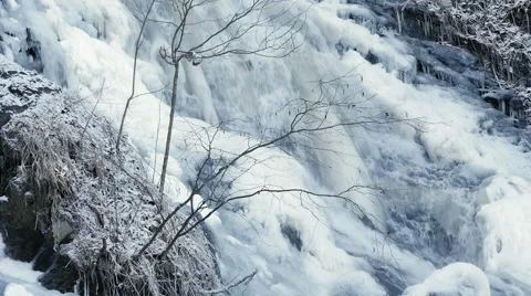 Ice covered waterfall in slow motion. 動画素材 47107921
