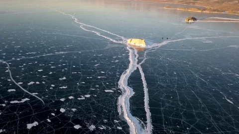 Ice with cracks in Lake Baikal in winter. Aerial view. Siberia, Russia. 스톡 동영상 113201682