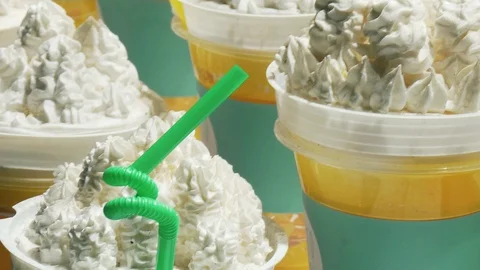 Ice cream and cake on cups in the store Stock Footage 100910380