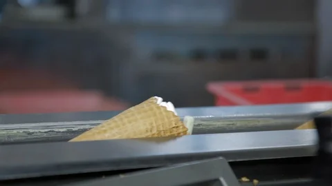 Ice-cream automatic production line. Filling of wafer cups with ice cream. Ice 스톡 동영상 120919306