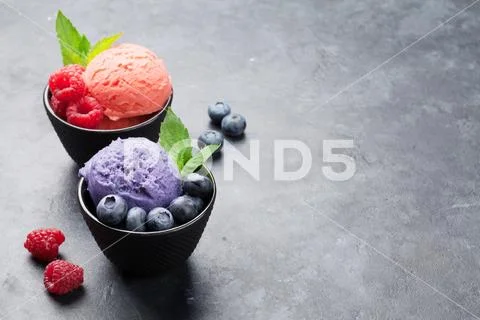 Ice cream with berries Stock Photos