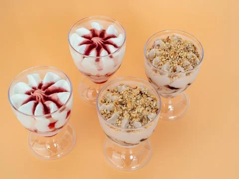 Ice cream on a bright orange background. Stock Photos