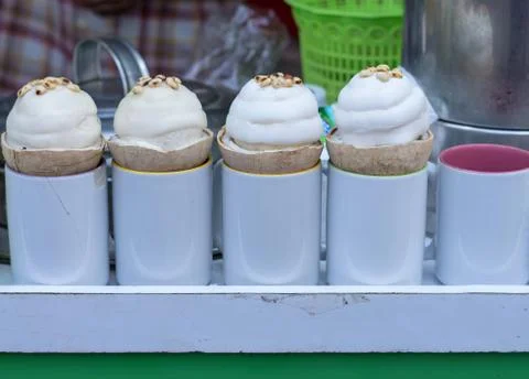 Ice cream on coconut shell Stock Photos