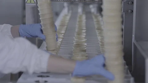 Ice cream factory workers hands Stock Footage