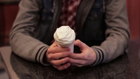 Ice cream in the hands of the guy. Stock Footage 74375269