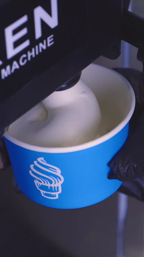Ice cream machine for cooking and making delicious vanilla ice cream slowmotion Stock Footage 178999570