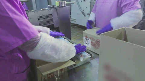 Ice cream making process. Modern ice cream factory. Automatic packaging line in Stock Footage 255717936