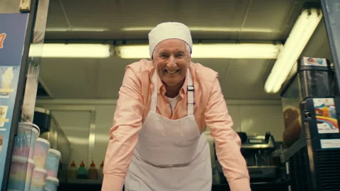 Ice cream man looking at the camera Stock Footage 264029412