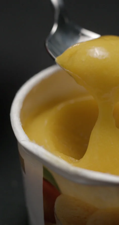Ice cream mango melted slow motion, vertical view Stock Footage 280521143