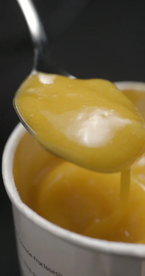 Ice cream mango melted slow motion, vertical view Stock-Footage 280521184