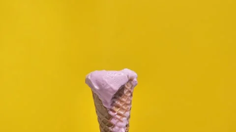 Ice cream melts in the cone Stock Footage 243669178