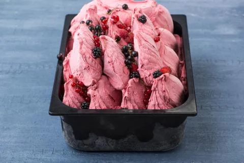 Ice cream in a plastic container Stock Photos