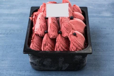 Ice cream in a plastic container Stock Photos