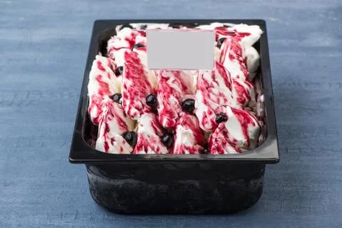 Ice cream in a plastic container Stock Photos