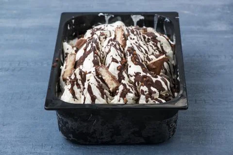 Ice cream in a plastic container Stock Photos