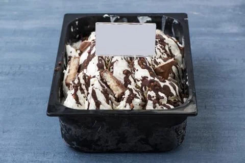 Ice cream in a plastic container Stock Photos