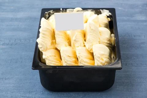 Ice cream in a plastic container Stock Photos