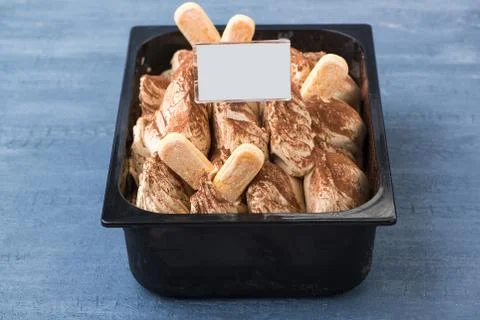 Ice cream in a plastic container Stock Photos