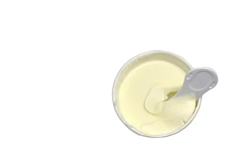 Ice cream with plastic spoon in paper cup Fotos Stock