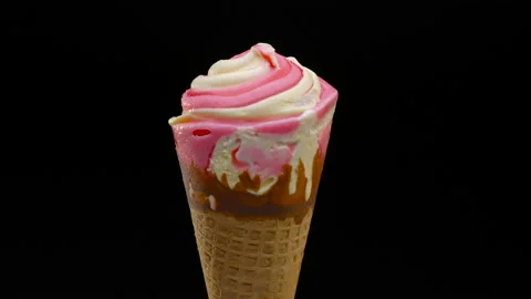 Ice Cream rotating over black background Stock Footage 93561041