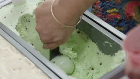 Ice cream scoop from the container  Stock Footage 245468845