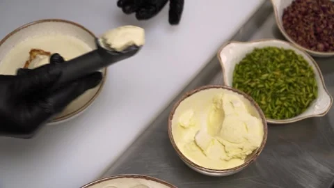 Ice Cream Scooping in a Kitchen Stock Footage 319950391