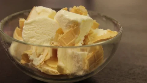 Ice cream sliced in a plate Stock Footage 74504032