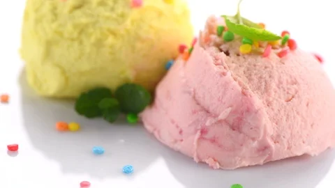 Ice cream. Strawberry or raspberry, banana or lemon flavor icecream rotated Stock Footage 88231152
