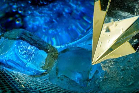 Ice crusher and cubes in the foreground Stock Photos