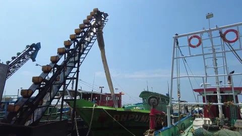 Ice crushing machine and conveyor, Thengapattanam Harbor, Kanyakumari Stock Footage 232833984