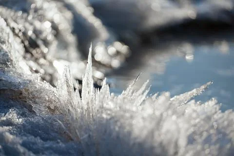 Ice crystals close up selective focus, blurred background Stock Photos