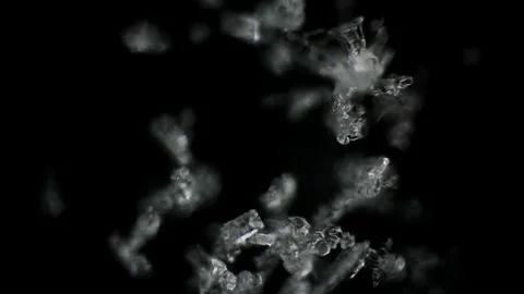 Ice crystals melt under the microscope Stock Footage 75811592