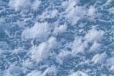Ice crystals on the surface of the ice Stock Photos