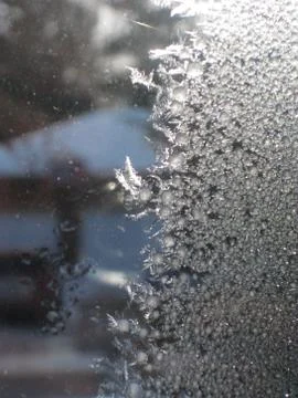 Ice crystals on window Stock Photos