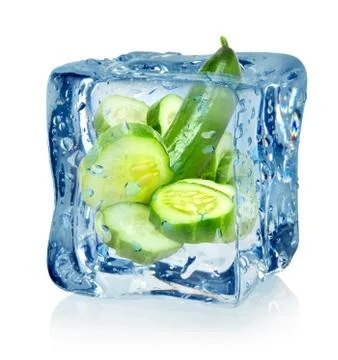 Ice cube and cucumber Stock Photos